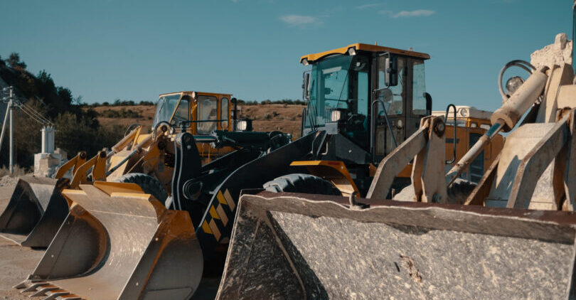 Heavy machinery in quarry. Building materials mining