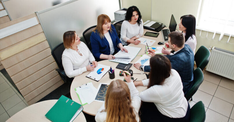 Business people group of bank workers have meeting and working in modern office, sitting at the desk,creating new ideas.